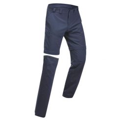 Spodnie turystyczne męskie Quechua MH150 2w1. Niebieskie spodnie sportowe męskie QUECHUA, l, bez wzorów, z materiału, trekkingowe. Za 99.99 zł.