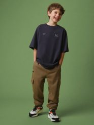 4F Spodnie dresowe cargo chłopięce - brązowe 164 (13-14 lat). Brązowe spodnie sportowe dla chłopców 4f, bez wzorów, z dresówki, sportowe, do biegania. Za 129.99 zł.