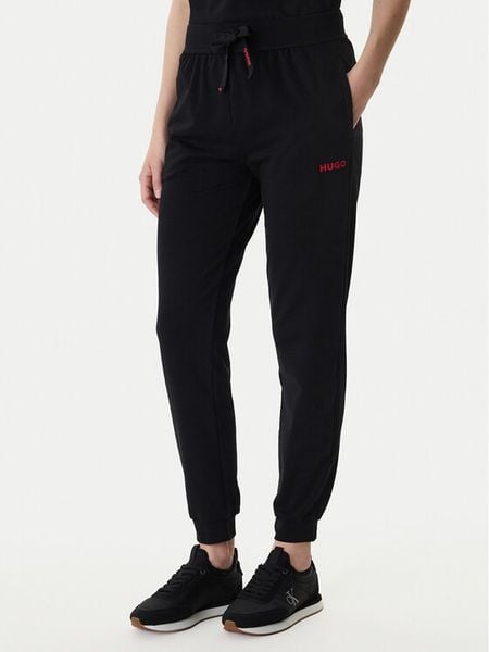 HUGO Spodnie dresowe 50556326 Czarny Regular Fit. Czarne spodnie dresowe damskie Hugo, m, bez wzorów, z bawełny. Za 279.99 zł.