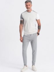 Ombre Męskie spodnie dresowe typu jogger - szare V8 OM-PABS-0173 M. Szare spodnie sportowe męskie Ombre, m, bez wzorów, z dresówki. Za 89.99 zł.