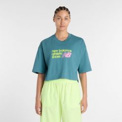 Koszulka damska New Balance WT51908AAZ – niebieska. Niebieskie t-shirty damskie New Balance, l, bez wzorów, z bawełny, bez kołnierzyka. Za 169.99 zł.