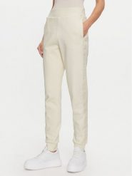 Guess Spodnie dresowe Stacie V4BB00 KC5O0 Écru Regular Fit. Spodnie dresowe damskie Guess, s, z aplikacjami, z bawełny. Za 199.99 zł.