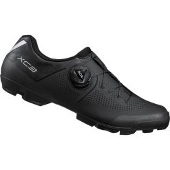 Buty rowerowe XC302W do rowerów górskich, czarne. Czarne obuwie sportowe damskie Shimano, bez wzorów, ze skóry, rowerowe. Za 479.99 zł.