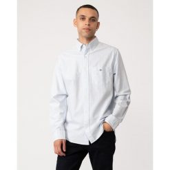 Koszula w paski Gant Classic Oxford. Niebieskie koszule męskie GANT, l, z aplikacjami, z bawełny, eleganckie, bez kołnierzyka, bez ramiączek. Za 493.50 zł.