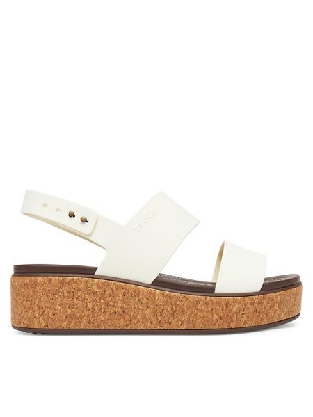 Crocs Sandały Brooklyn Cork Low Wedge 211144 Écru. Sandały damskie Crocs, bez wzorów, z tworzywa sztucznego, bez obcasa, na płaskiej podeszwie, bez zapięcia. Za 169.99 zł.