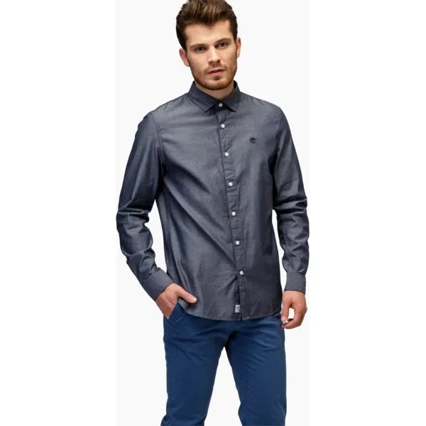 Timberland Koszula Ls Milford Solid Oxford Slim , niebieski, rozmiar M. Niebieskie koszule męskie Timberland, m, bez wzorów, z materiału, klasyczne, bez kołnierzyka, bez ramiączek. W wyprzedaży za 259.99 zł.