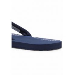Klapki Puma Epic Flip V2 unisex. Brązowe klapki damskie Puma, bez wzorów, z materiału, sportowe, bez obcasa. Za 244.00 zł.