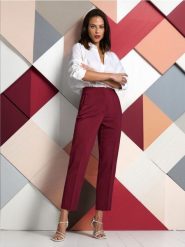 Spodnie cygaretki - bordowy. Czerwone spodnie materiałowe damskie Sinsay, l, bez wzorów, z podwyższonym stanem. Za 49.99 zł.