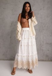 Biało-Beżowa Bawełniana Spódnica Casual w Stylu Boho Ozdobiona Wycięciami i Haftowanymi Wzorami Hermat. Brązowe spódnice damskie Renee, l, z aplikacjami, z bawełny, boho, z podwyższonym stanem, maxi, dopasowane. Za 129.99 zł.