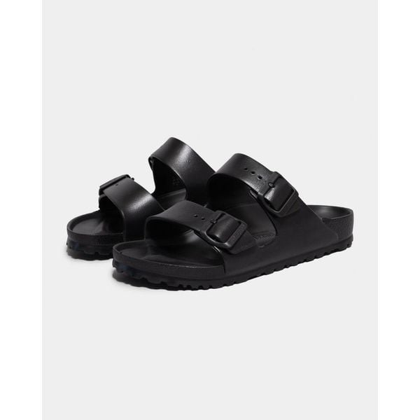 Klapki damskie Birkenstock Arizona W Eva. Czarne klapki damskie Birkenstock, bez wzorów, z materiału, bez obcasa. Za 274.95 zł.
