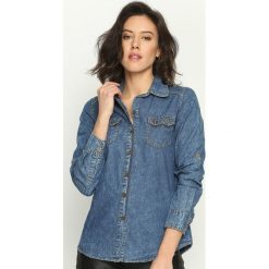 Niebieska Koszula Jeansowa Youth. Niebieskie bluzki damskie Born2be, bez wzorów, z denimu, bez kołnierzyka, bez ramiączek. Za 49.99 zł.
