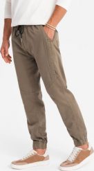 Ombre Dzianinowe męskie spodnie joggery z ozdobną plisą ciemnobrązowe V2 OM-PAJO-0202 XL. Brązowe spodnie sportowe męskie Ombre, m, bez wzorów, z dzianiny. Za 229.99 zł.