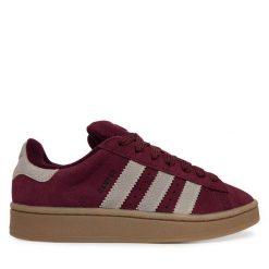 Sneakersy adidas. Czerwone trampki i tenisówki chłopięce Adidas, bez wzorów, bez zapięcia. Za 399.99 zł.