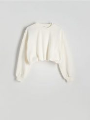 Krótka bluza ze ściągaczem - złamana biel. Bluzy damskie Reserved, l, bez wzorów, z bawełny, bez kaptura. W wyprzedaży za 49.99 zł.