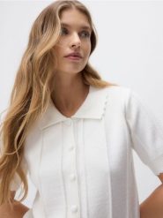 Kardigan z kołnierzem - kremowy. Białe kardigany damskie Reserved, l, bez wzorów, z dzianiny. Za 129.99 zł.