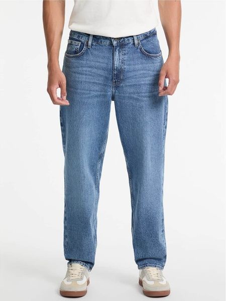 Guess Jeans Jeansy M5GA90 D5M53 Niebieski Taper Fit. Niebieskie jeansy męskie Guess Jeans. Za 350.99 zł.