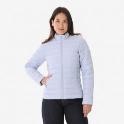Kurtka turystyczna zimowa damska Quechua MH100. Fioletowe kurtki damskie QUECHUA, na zimę, l, bez wzorów, z materiału, bez kaptura. Za 119.99 zł.