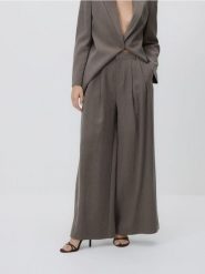 Spodnie z wiskozą - beżowy. Brązowe spodnie materiałowe damskie Reserved, l, bez wzorów, z tkaniny. Za 139.99 zł.