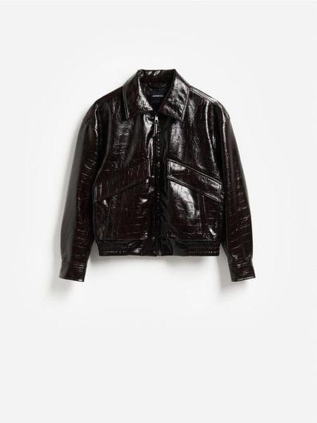 Kurtka z imitacji skóry - mahoniowy. Brązowe kurtki damskie Reserved, l, bez wzorów, ze skóry, bez kaptura. Za 259.99 zł.