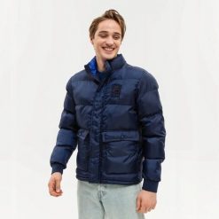KURTKA MĘSKA ZIMOWA FILA SKIP M. Niebieskie kurtki męskie Fila, na zimę, m, bez wzorów, z dresówki, trekkingowe. Za 470.48 zł.