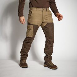 Spodnie outdoor Solognac Renfort 520. Brązowe spodnie sportowe męskie SOLOGNAC, m, bez wzorów, z bawełny, outdoorowe. Za 159.99 zł.