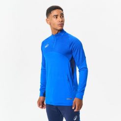 Bluza piłkarska Kipsta CLR Club na krótki suwak. Niebieskie bluzy męskie KIPSTA, l, bez wzorów, z materiału, bez kaptura, na fitness i siłownię. Za 139.99 zł.