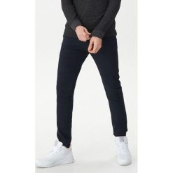 Spodnie chino w kratkę - Granatowy. Spodnie materiałowe męskie House. Za 119.99 zł.