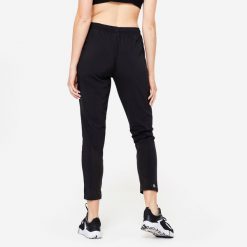 Spodnie fitness damskie Domyos krój marchewki. Czarne obuwie sportowe damskie DOMYOS, l, bez wzorów, z elastanu, na fitness i siłownię. Za 89.99 zł.