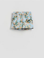 Wzorzyste szorty plażowe - żółty. Żółte szorty męskie Reserved, l, bez wzorów, z tkaniny. Za 79.99 zł.