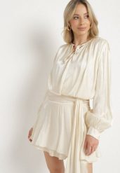 Beżowa Wiskozowa Sukienka Ozdobiona Wiązaniem i Falbanką Rallio. Brązowe sukienki damskie Born2be, na co dzień, l, z aplikacjami, z jeansu, eleganckie, bez kołnierzyka, bez ramiączek, mini, proste. Za 139.99 zł.