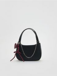 Torebka z zawieszką - czarny. Czarne torby i plecaki dziecięce Reserved, ze skóry. Za 69.99 zł.