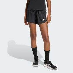 Szorty Pacer Workout Woven 2in1. Białe szorty sportowe damskie Adidas, l, bez wzorów, z elastanu, eleganckie, z standardowym stanem, na fitness i siłownię, climacool (adidas). Za 179.00 zł.
