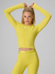 4F Longsleeve treningowy slim szybkoschnący damski - żółty S. Żółte koszulki sportowe damskie 4f, s, bez wzorów, bez kołnierzyka, bez ramiączek, na fitness i siłownię. Za 149.99 zł.