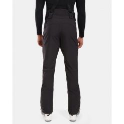 Spodnie narciarskie Kilpi Rhea. Czarne spodnie sportowe męskie Kilpi, na zimę, m, bez wzorów, narciarskie. Za 473.69 zł.