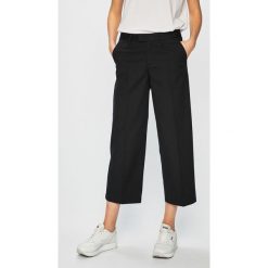 Vans - Spodnie. Spodnie materiałowe damskie marki Vans. Za 259.90 zł.