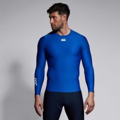 Koszulka termoaktywna z długim rękawem Canterbury. Niebieskie koszulki sportowe męskie CANTERBURY, s, bez wzorów, ze skóry, bez kołnierzyka, bez ramiączek, na fitness i siłownię. Za 293.00 zł.