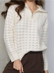 Ażurowy sweter chunky - kremowy. Białe swetry damskie Sinsay, l, w ażurowe wzory, bez kołnierzyka, bez ramiączek, bez kaptura. Za 69.99 zł.