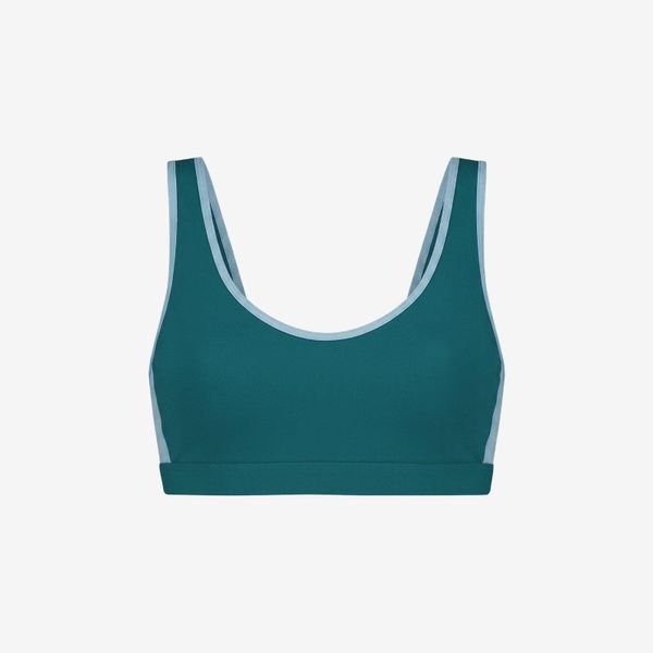 Damski top sportowy Premium - Morski. Niebieskie topy damskie WALLIEN, l, bez wzorów, z elastanu, bez kołnierzyka, bez ramiączek. Za 420.00 zł.