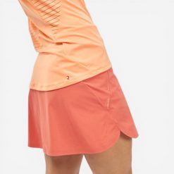 Koszulka turystyczna na ramiączka damska Quechua MH500. Brązowe koszulki sportowe damskie QUECHUA, m, bez wzorów, z elastanu, bez kołnierzyka, bez ramiączek, trekkingowe. Za 34.99 zł.