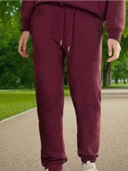Spodnie dresowe jogger - czerwony. Czerwone spodnie dresowe damskie Sinsay, l, bez wzorów, z dresówki. Za 29.99 zł.