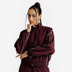 Bluza dresowa damska Heritage. Fioletowe bluzy damskie Decathlon, s, bez wzorów, z dresówki, bez kaptura. Za 129.99 zł.