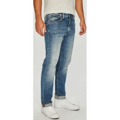 Mustang - Jeansy Tramper. Niebieskie jeansy męskie Mustang. W wyprzedaży za 219.90 zł.
