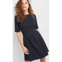 Rozkloszowana sukienka. Sukienki damskie marki Orsay. Za 79.99 zł.