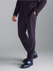 Garniturowe spodnie slim fit - mahoniowy. Brązowe eleganckie spodnie męskie Reserved, bez wzorów, z tkaniny. Za 169.99 zł.