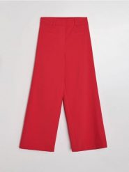 Spodnie wide leg z domieszką wiskozy - czerwony. Czerwone spodnie materiałowe damskie Sinsay, l, bez wzorów, z wiskozy. Za 49.99 zł.