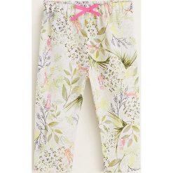 Mango Kids - Spodnie dziecięce Ariap 80-104 cm. Białe legginsy dla dziewczynek Mango Kids, bez wzorów, z bawełny. W wyprzedaży za 49.90 zł.