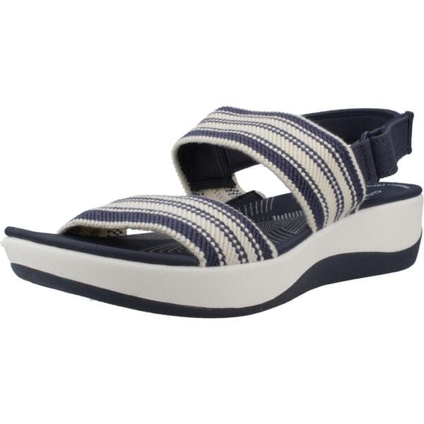 Sandały CLARKS 26181748C Niebieski. Niebieskie obuwie sportowe damskie Clarks, bez wzorów, z tkaniny, bez obcasa, bez zapięcia. Za 206.99 zł.
