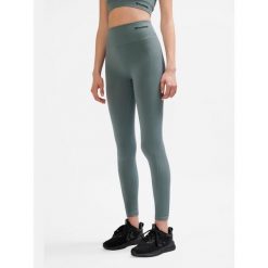 Legginsy sportowe dla kobiet Hummel. Szare legginsy damskie Hummel, bez wzorów, z materiału, na fitness i siłownię. Za 130.50 zł.