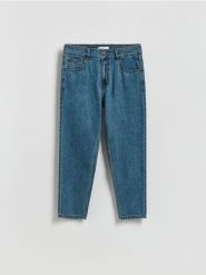 Jeansy carrot z efektem sprania - indigo jeans. Niebieskie jeansy męskie Reserved. Za 159.99 zł.