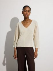 Sweter kimono z domieszką lnu - beżowy. Brązowe swetry damskie Reserved, l, bez wzorów, z dzianiny, bez kołnierzyka, bez ramiączek, bez kaptura. W wyprzedaży za 59.99 zł.